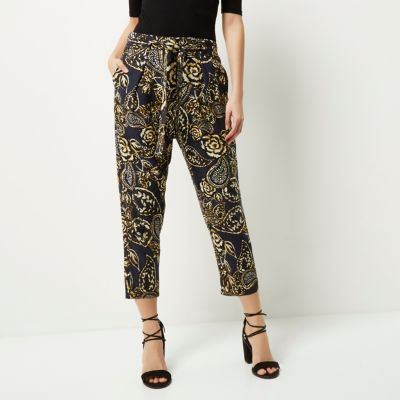 Navy floral print trousers